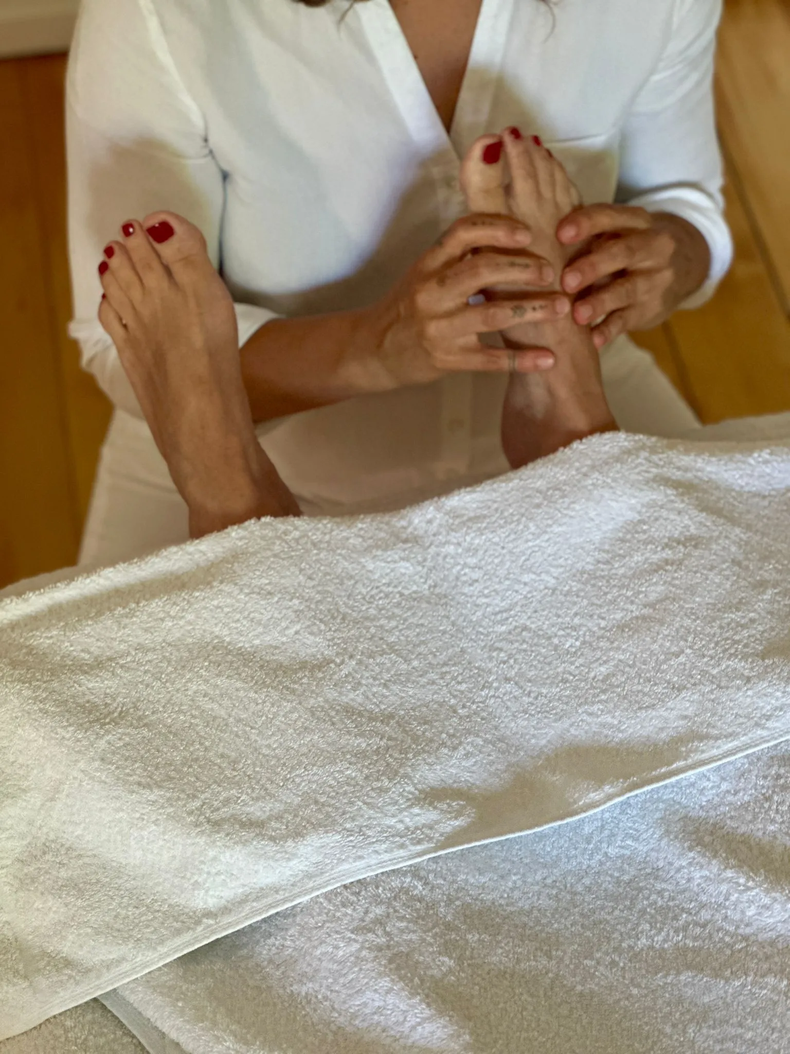 Druckmassage an den Fusssohlen